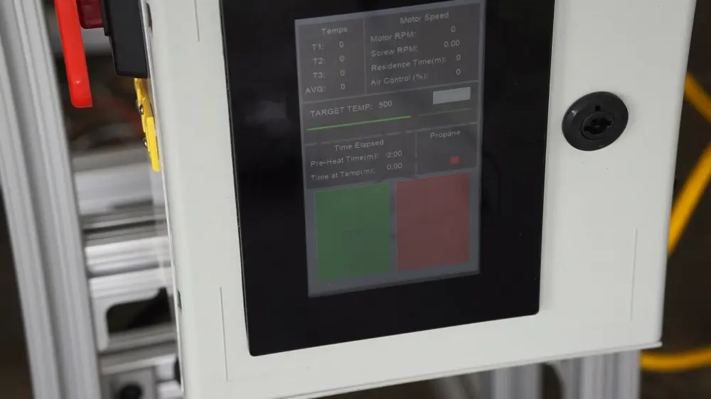 HMI showing target temp 500 °C, motor speed, residence time